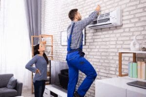 A woman getting an AC consult from an AC professional